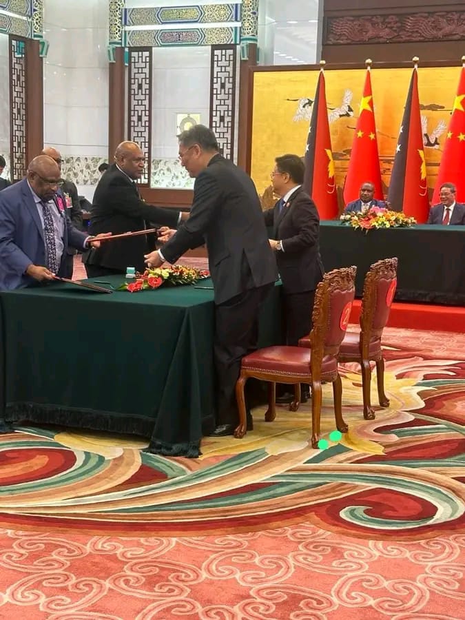 Minister for Works and Highways Hon.Solan Mirisim signs a historical MOU with the Chinese counterpart