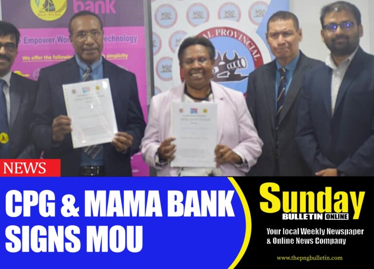 Central Governor Rufina Peter with members of Mama Bank after the signing ceremony.