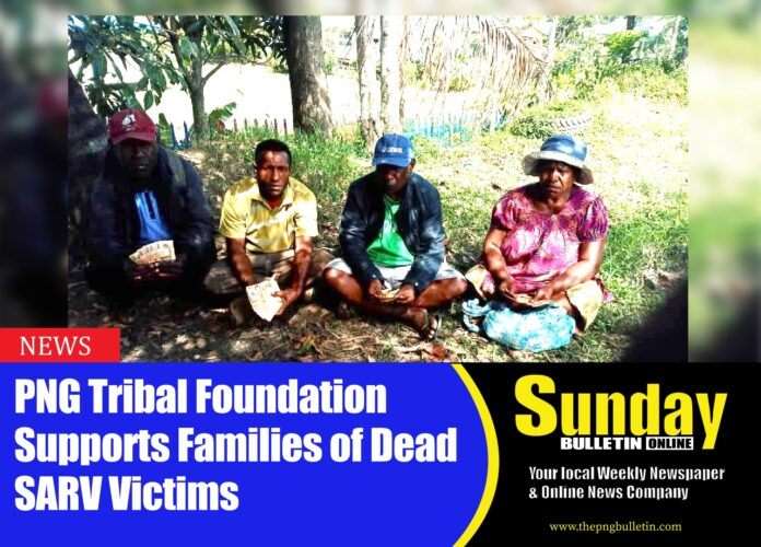 Relatives of the SARV Victim died last week received funding from PNG Tribal Foundation in Piau village , Sinesine Yongomugl district , for the burial of the woman . Photo supplied.