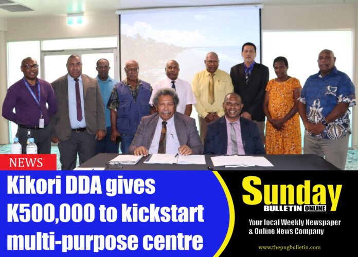 Member for Kikori Open and Minister for Provincial and Local Level Government Affairs Hon. Soroi Eoe, with Minister for Community Development and Religion Jason Peter, Secretary Jerry Ubase (standing, second from right), and KDDA board members after the MoA signing at Gateway Hotel, Port Moresby. Photo supplied.