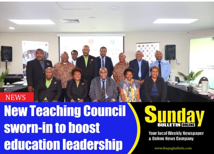 Some of the newly sworn-in Teaching Council members with Acting Chairman of the Teaching Service Commission, Samson Wangihomie.