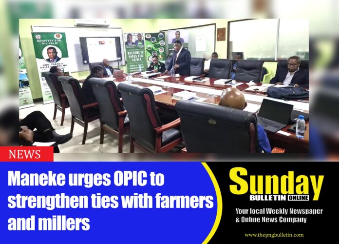 MINISTER for Oil Palm, Hon. Francis Galia Maneke (standing) addressing the board of the Oil Palm Industry Corporation (OPIC). Picture supplied.