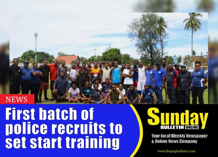 Candidates in Madang Province with RPNGC Recruitment Officers after the Physical Training Test in Madang. Picture supplied by Police Media Team.