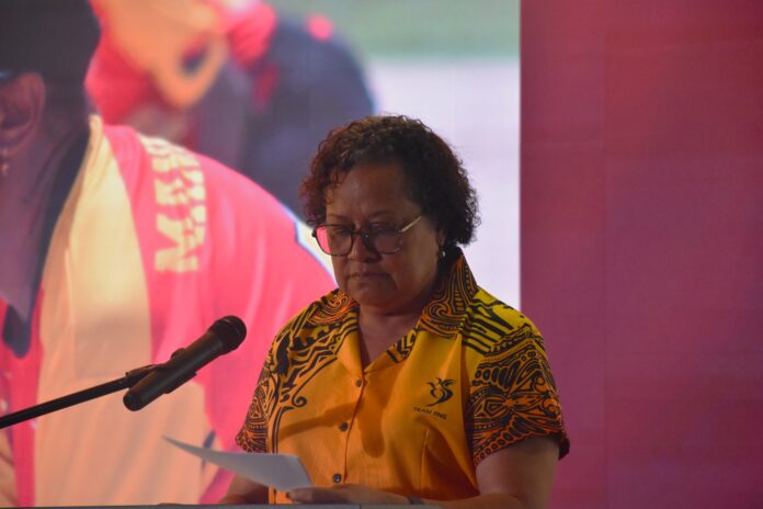 PNGOC resident Emma Waiwai addresses the athletes at Kwalimu Haus in Port Moresby yesterday. Picture by Gabriel Katuho