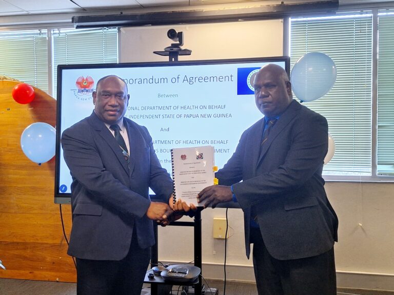 L-R: Papua New Guinea's Health Minister Elias Kapavore and Autonomous Bougainville Government Health Minister Dennis Lokonai. Photo by DALCY LULUA