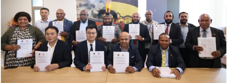 Ok Tedi, China Railway and Western Province Government and Administration representatives at the signing ceremony yesterday.