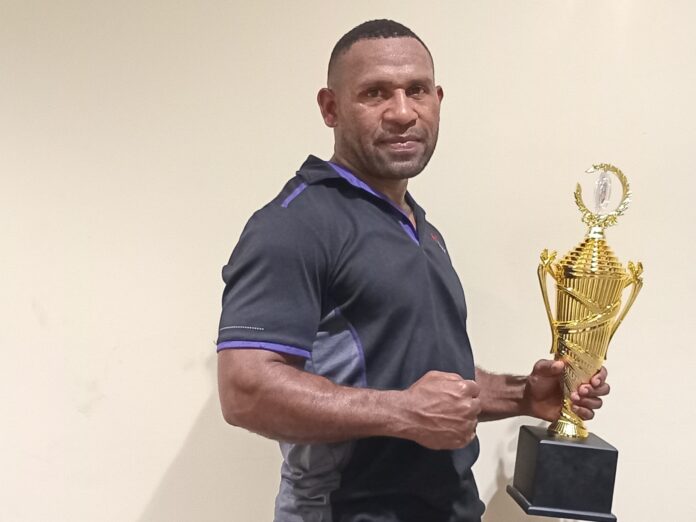 Caption: Jeffery Daka of Team Iron Simbu after the championship. – Picture by JOEL Andrew