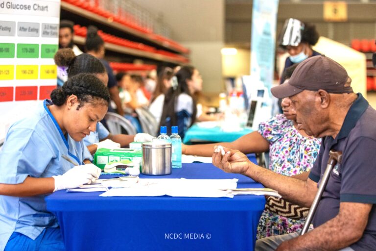 A medical officer attending to a patient at the Sir John Guise Stadium last Sunday. Picture supplied,