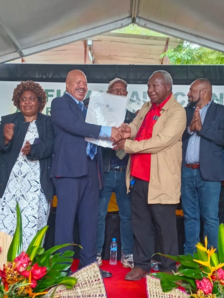 Kaupa presents land title for Portion 2464 to NCDC