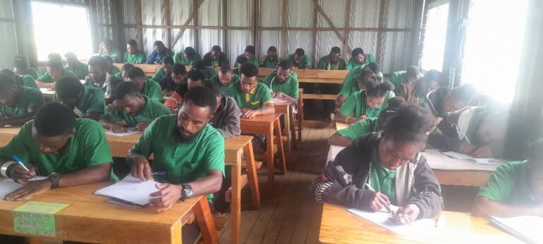 After years on the floor, Uma students finally receive desks