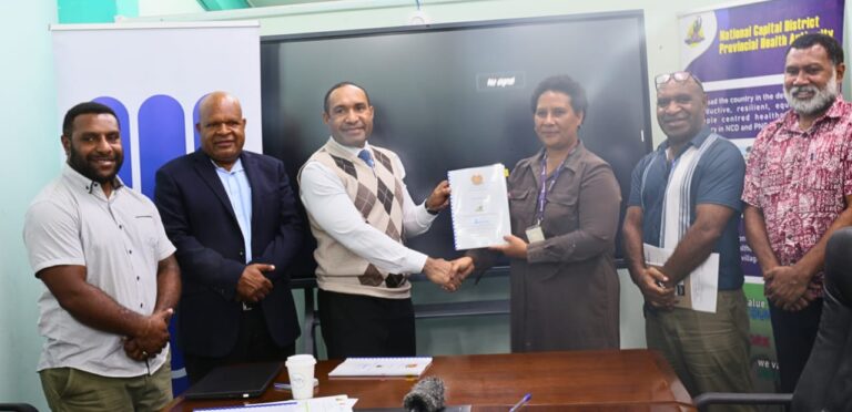 Official signing of reference for NCDPHA Infection, Prevention and Control – WaSH Sub-Committee with WaterAid PNG