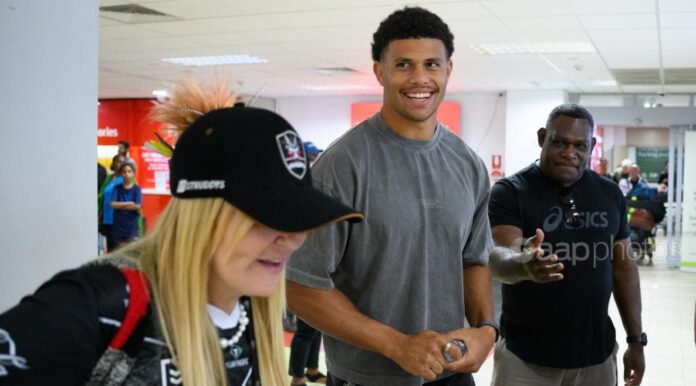 Reconciled father and son Marcus and Cooper Brai met at Jacksons International airport. (Dan HimbrechtsAAP PHOTOS)